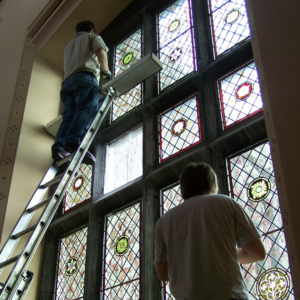 installing stained glass windows in Turlira castle