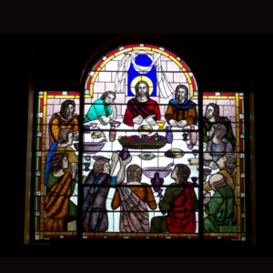 painted stained glass depicting the lords supper, designed by Vicki Crowley