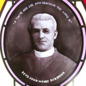 closeup of portrait, painted stained glass at conary church