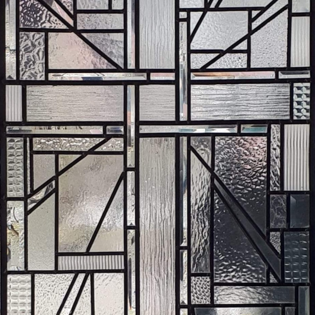 clear textured glass with bevel in cross design